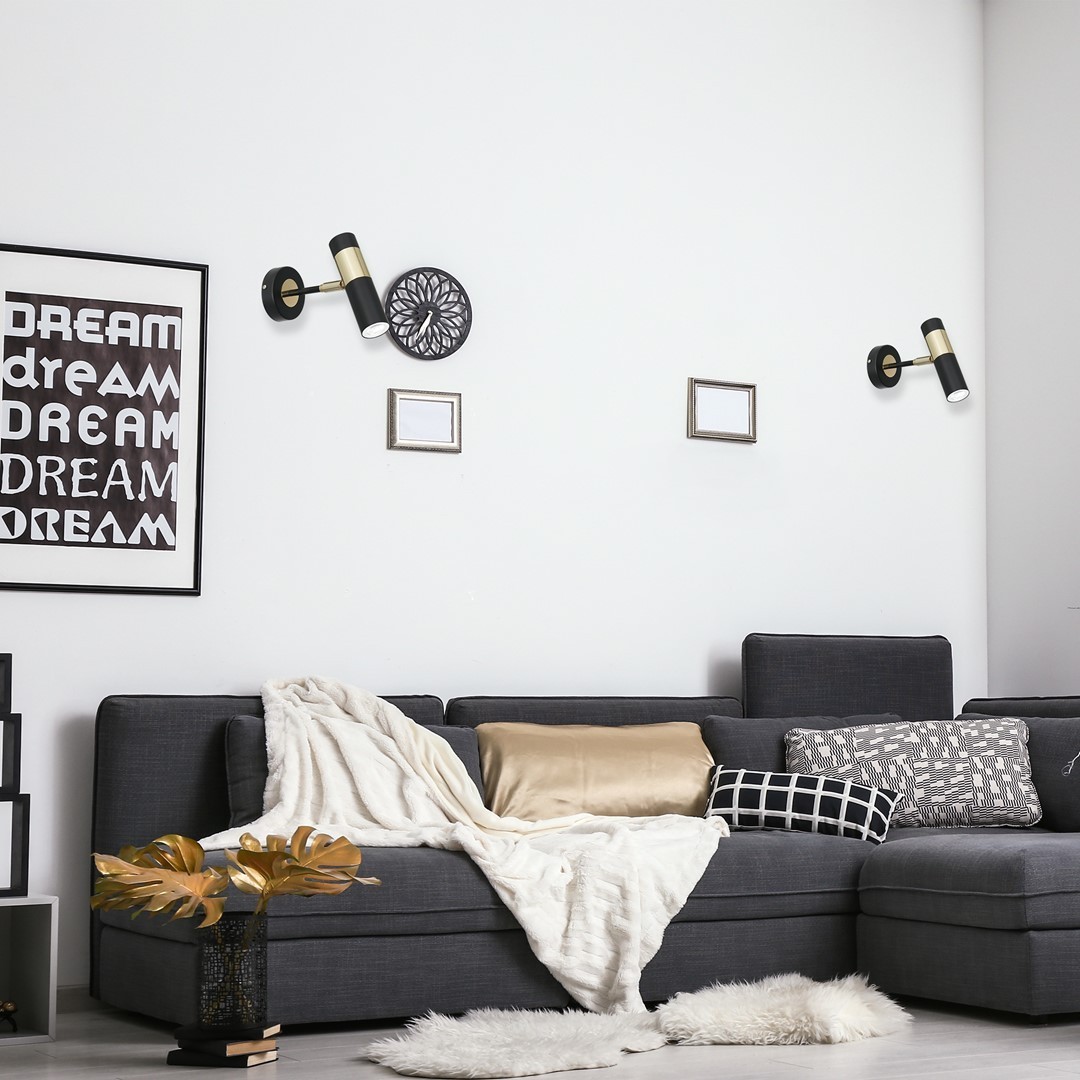 Kinkiety nowoczesne LED MiLAGRO Dallas Gold w salonie nad kanapą