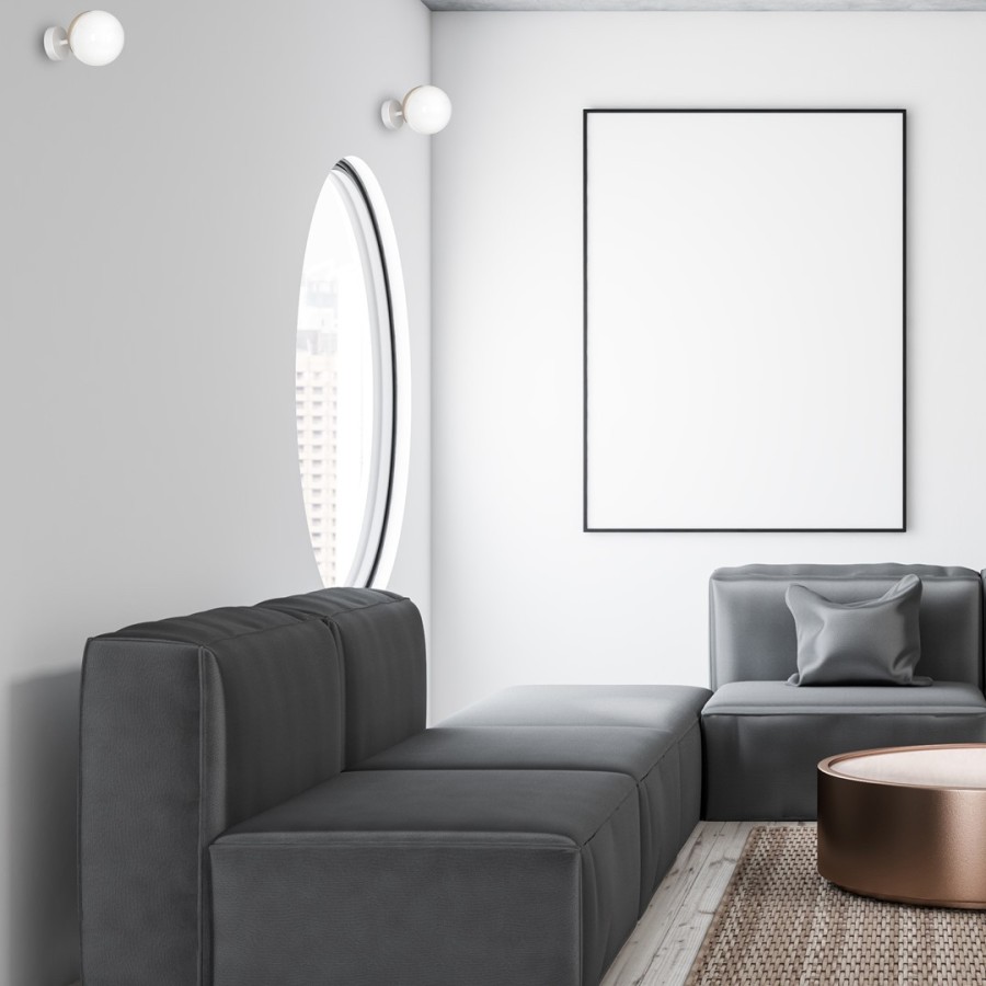 Białe kinkiety - aranżacja w salonie