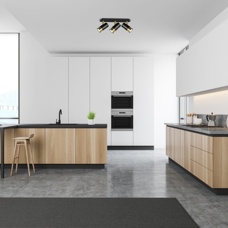 Czarna nowoczesna lampa sufitowa w kuchni z regulacją kąta padania światła