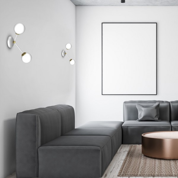 Kinkiet Joy od MiLAGRO w salonie nad kanapą