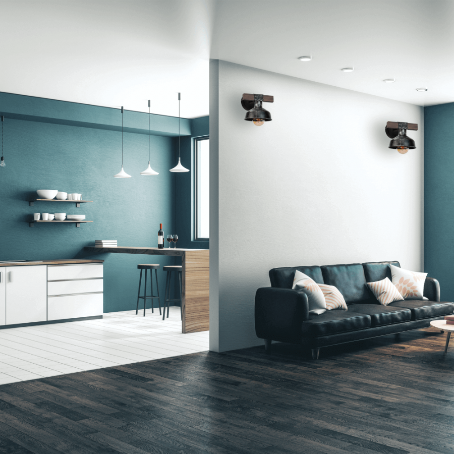 Kinkiety vintage umieszczone ponad kanapą w salonie