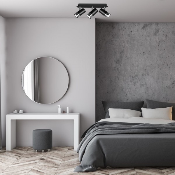 Czarna lampa sufitowa w sypialni