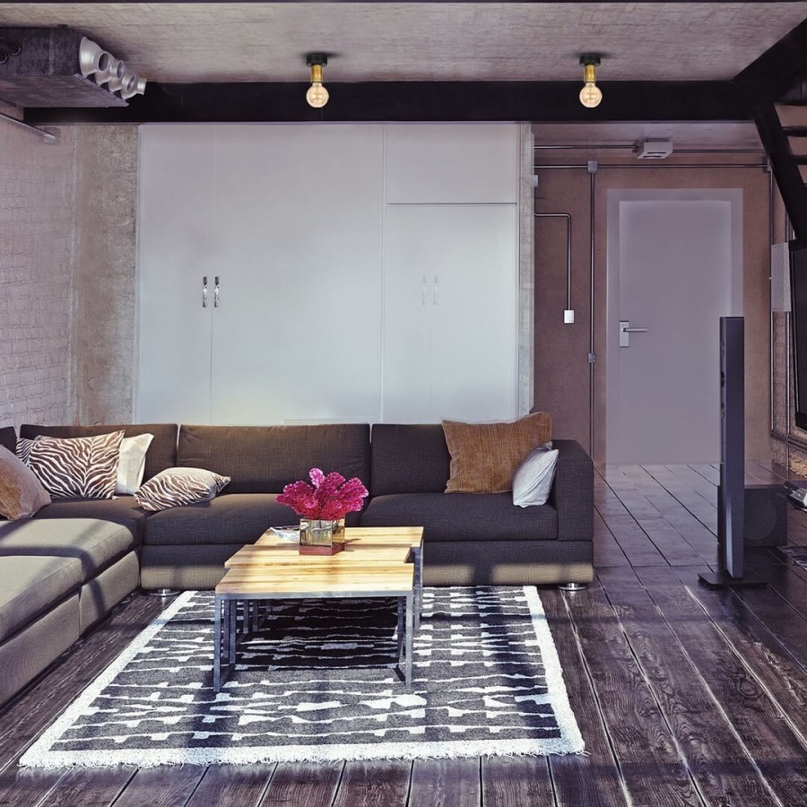 Salon w industrialnym stylu z lampami sufitowymi z odsłoniętymi źródłami światła