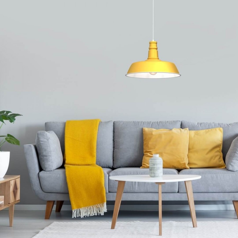 Żółta lampa z kolekcji Enzo w salonie